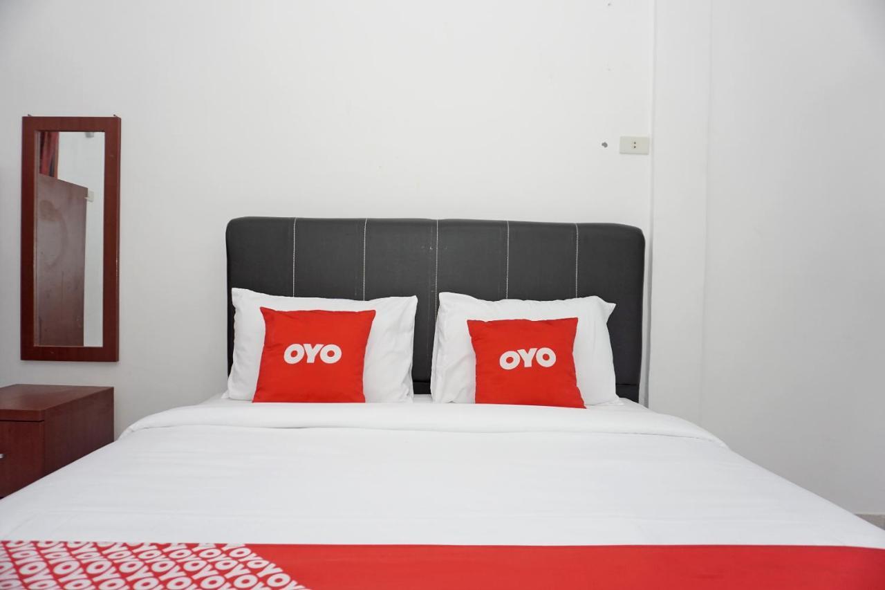Oyo 2635 Ramos Inn Sinapuran Esterno foto