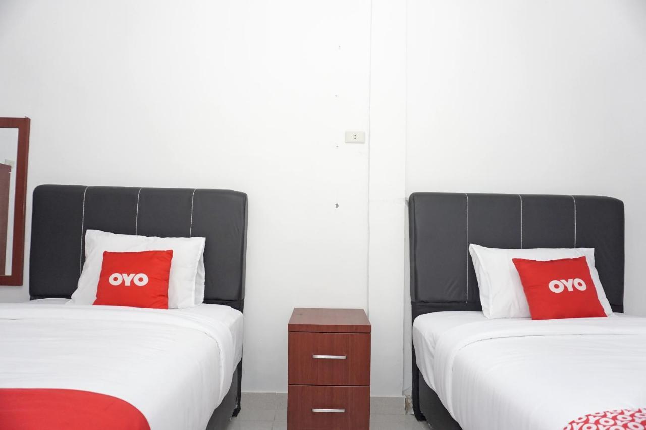 Oyo 2635 Ramos Inn Sinapuran Esterno foto